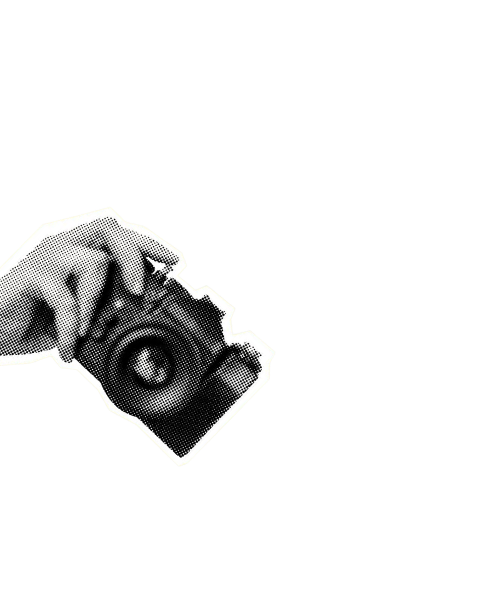 Hand holding DSLR camera